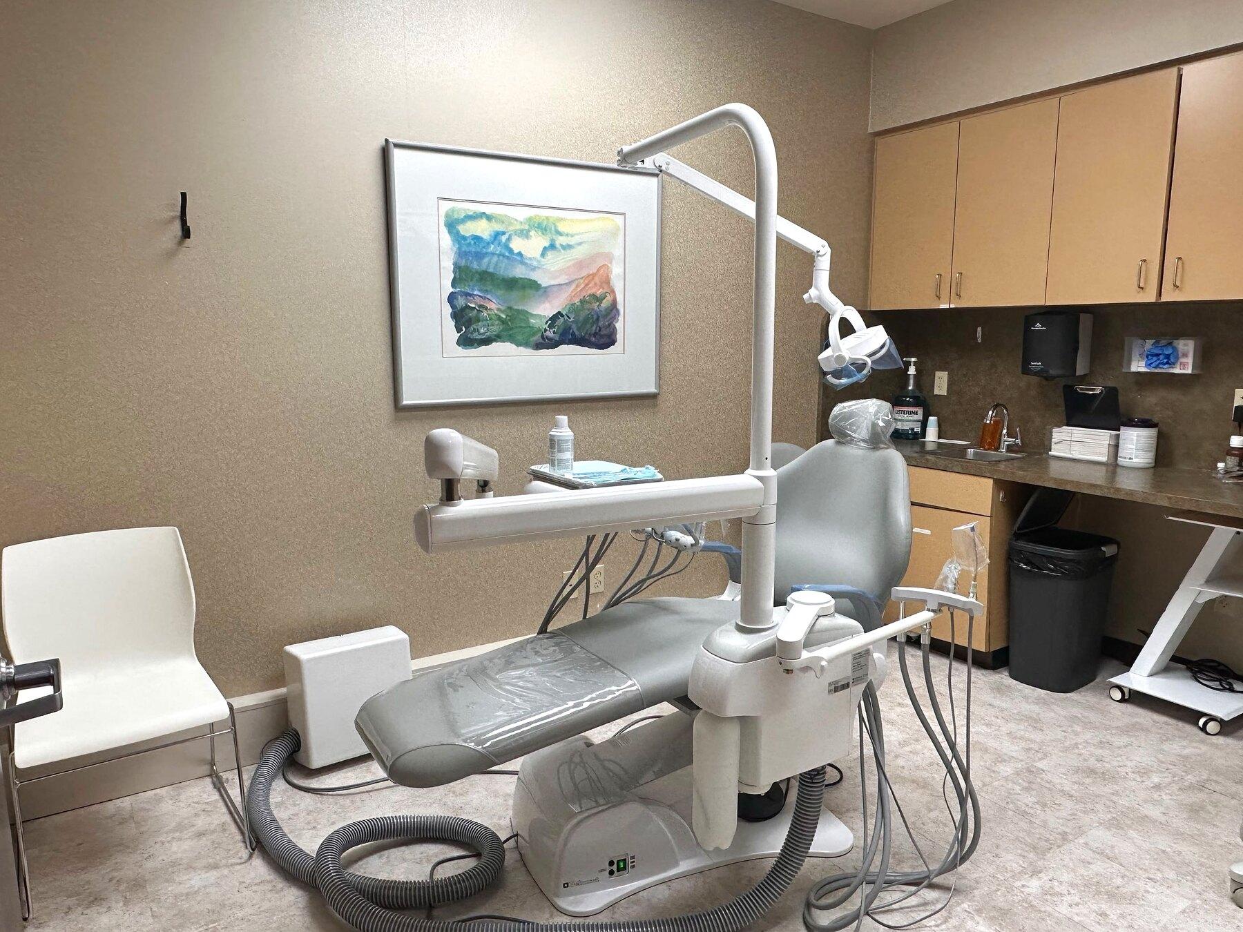 Treatment room at OAKS Oral Surgery, with the surgical chair beside the window